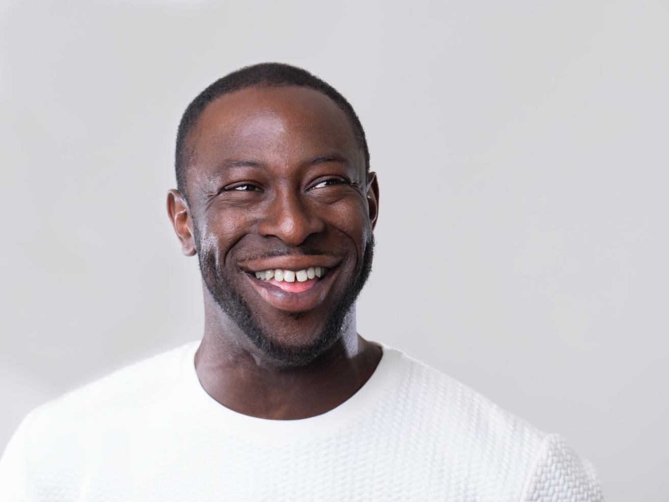A smiling candidate after completing identity verification