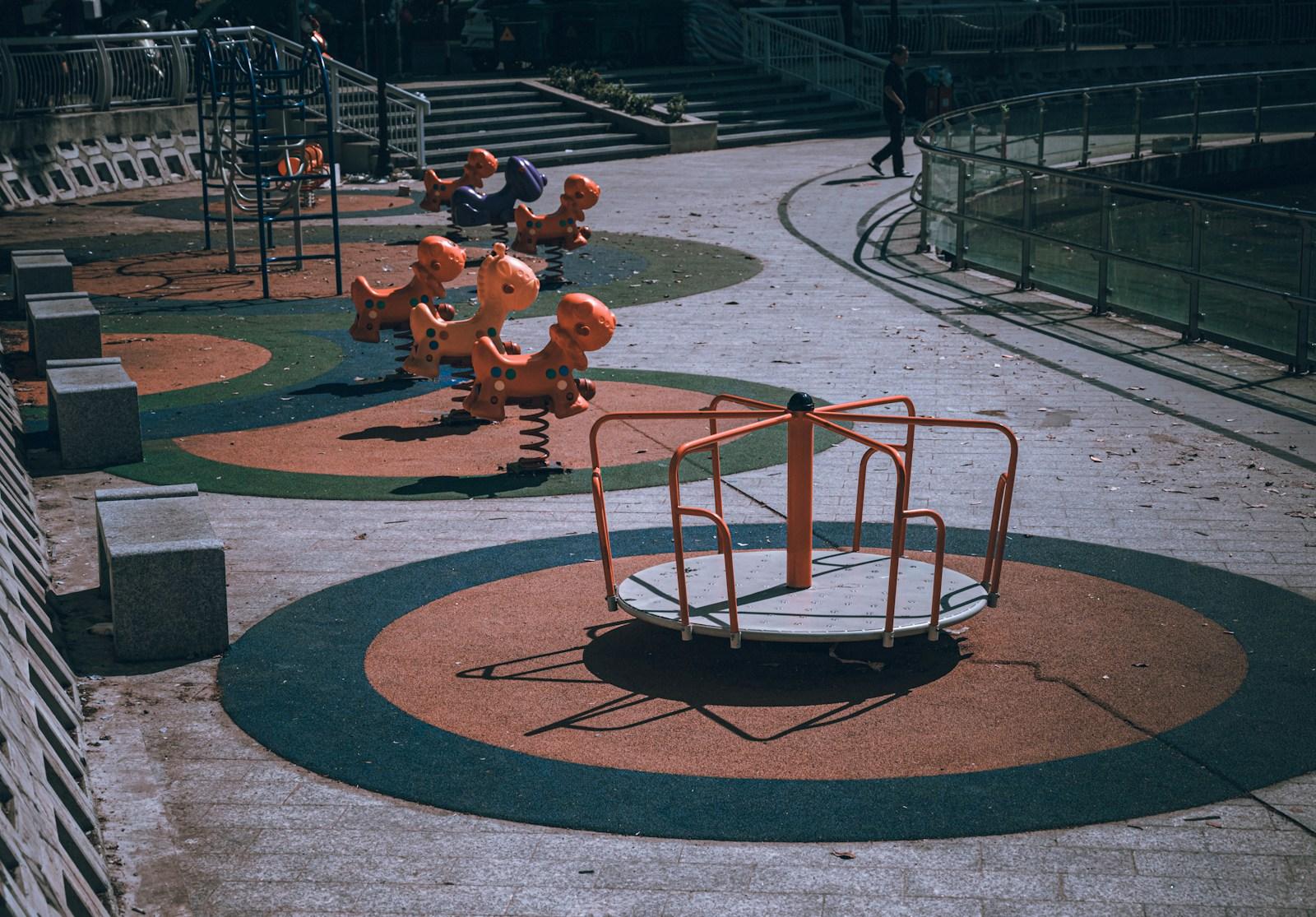 Empty urban playground with spring riders