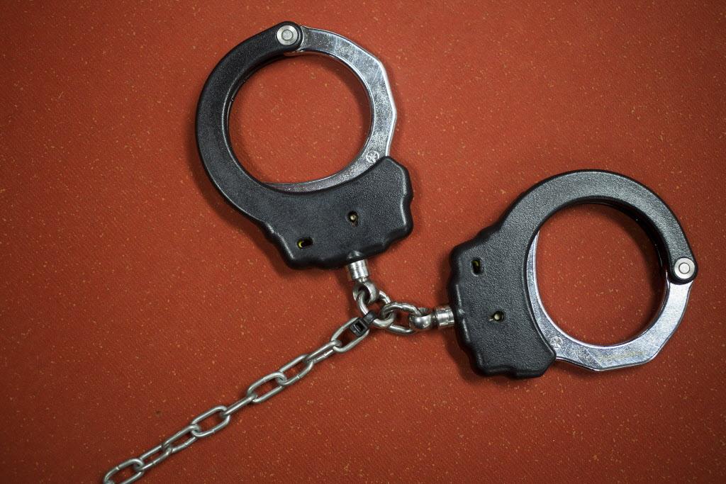 Handcuffs illustration accompanying the coaching report
