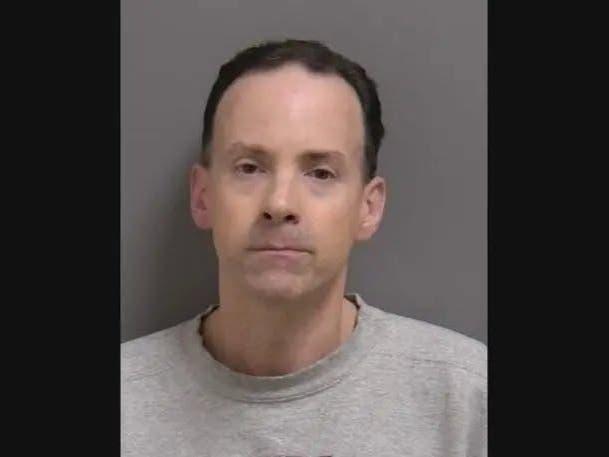 Tutor pictured in the report about his guilty plea